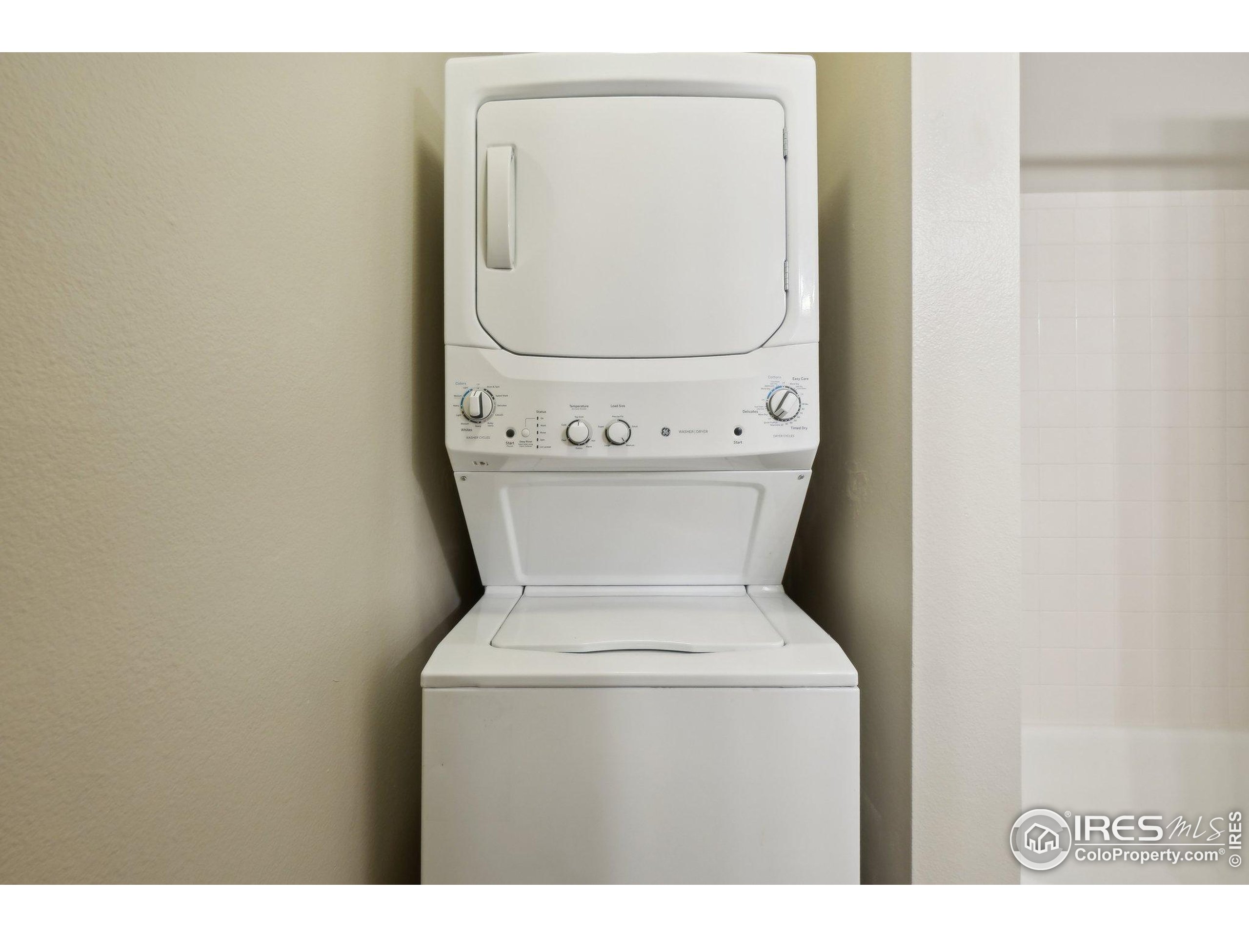1601 West Swallow Road, Unit 9 Fort Collins, CO 80526 - Photo 22 of 33 a utility room with dryer and washer