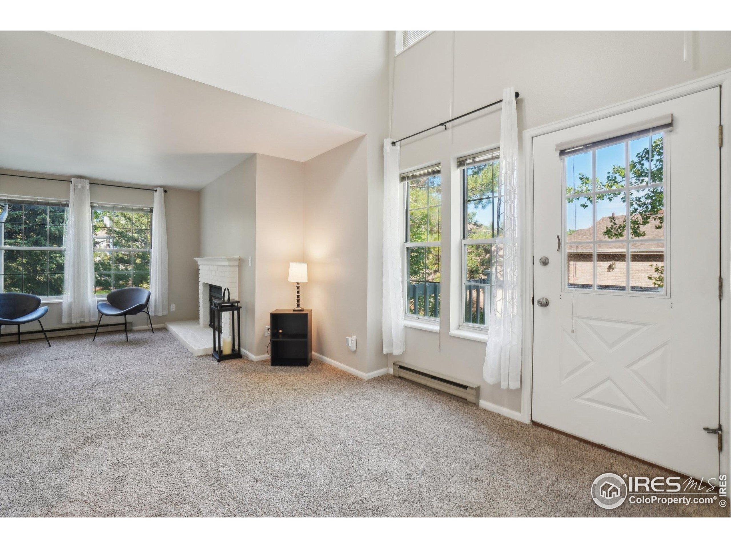 1601 West Swallow Road, Unit 9 Fort Collins, CO 80526 - Photo 8 of 33 a view of an empty room with a window