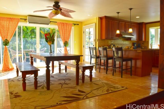 a view of a dining area with furniture window and outside view