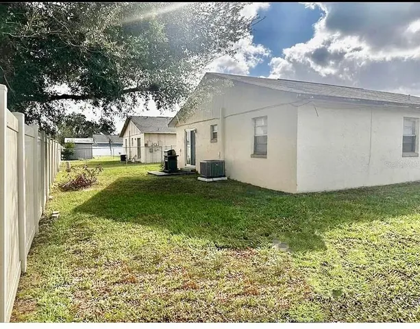 a house view with a garden space