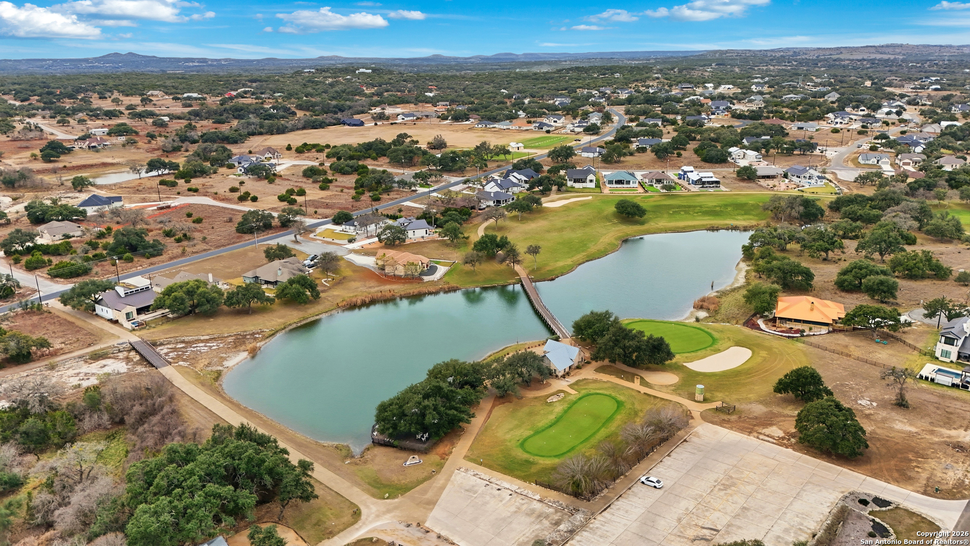 225 Levi English Blanco, TX 78606 - Photo 10 of 14 an aerial view of a house with a lake view
