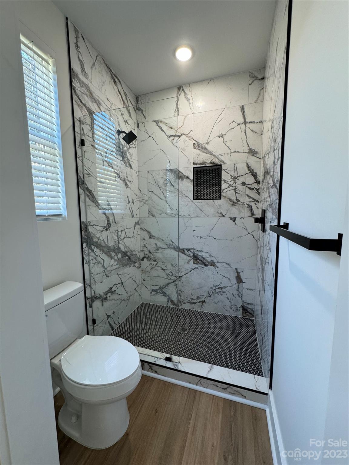 2208 Moose Road Kannapolis, NC 28083 - Photo 8 of 8 a bathroom with a toilet and a shower