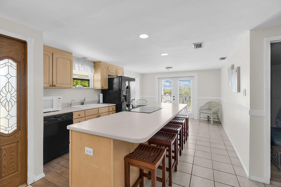 303 Sombrero Beach Road Marathon, FL 33050 - Photo 49 of 84 Side A-kitchen island & entry view