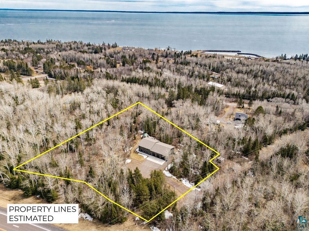 5174 Upper Peterson Road Duluth, MN 55804 - Photo 30 of 42 Aerial view of property's location featuring property boundaries highlighted and a large body of water