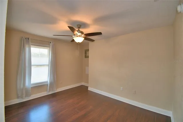 a bathroom with a shower and a toilet