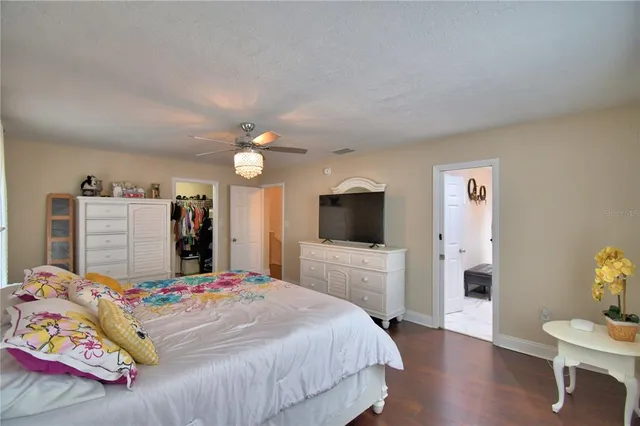 a view of a house with backyard and garage