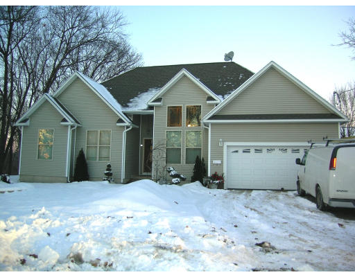 1 A Gardner Road Chicopee, MA 01013 - Photo 1 of 13 a front view of a house with a yard