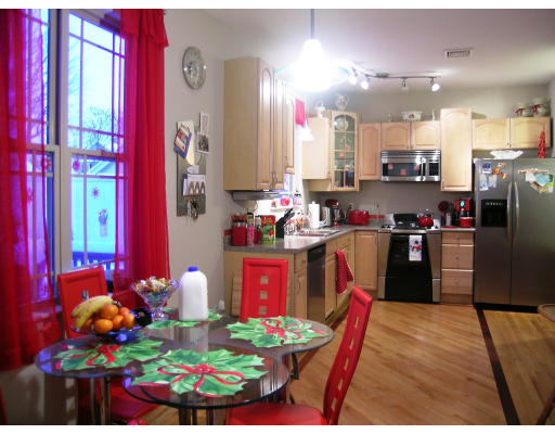 1 A Gardner Road Chicopee, MA 01013 - Photo 5 of 13 a kitchen with stainless steel appliances kitchen island granite countertop a refrigerator and stove