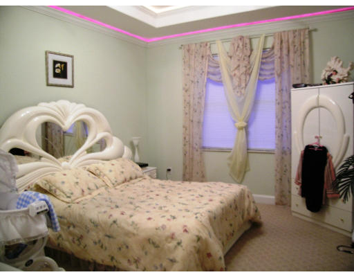 1 A Gardner Road Chicopee, MA 01013 - Photo 7 of 13 a bedroom with a bed and a painting on the wall