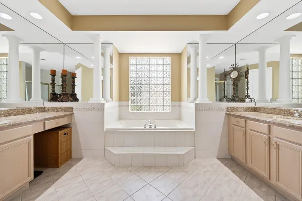 a bedroom with a bed and a cabinets