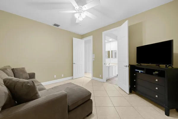 a view of a house with swimming pool and a yard