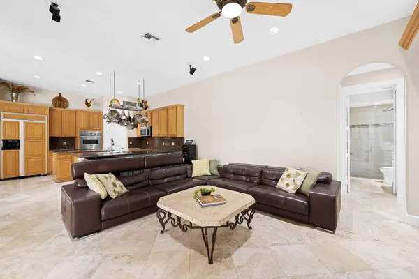 a room with furniture and a flat screen tv