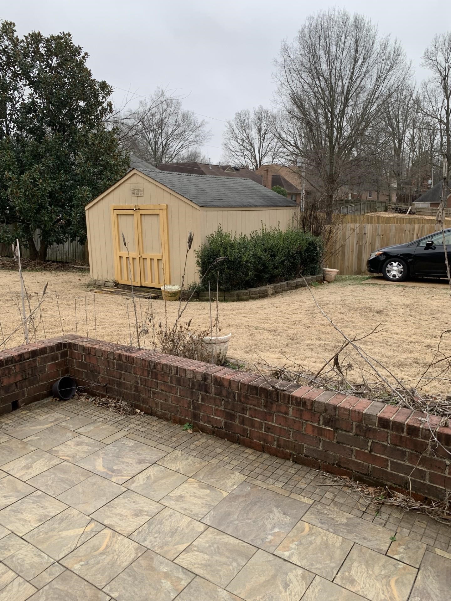 8717 Dexter Road Memphis, TN 38016 - Photo 11 of 12 Patio is finished with beautiful tile and has access to outside storage building.