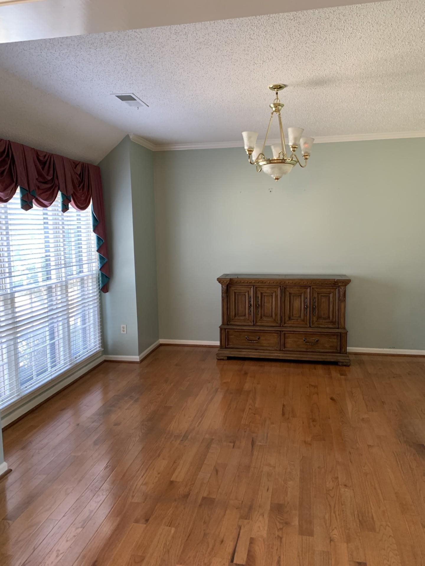 8717 Dexter Road Memphis, TN 38016 - Photo 5 of 12 Formal living room with light wood finished floors