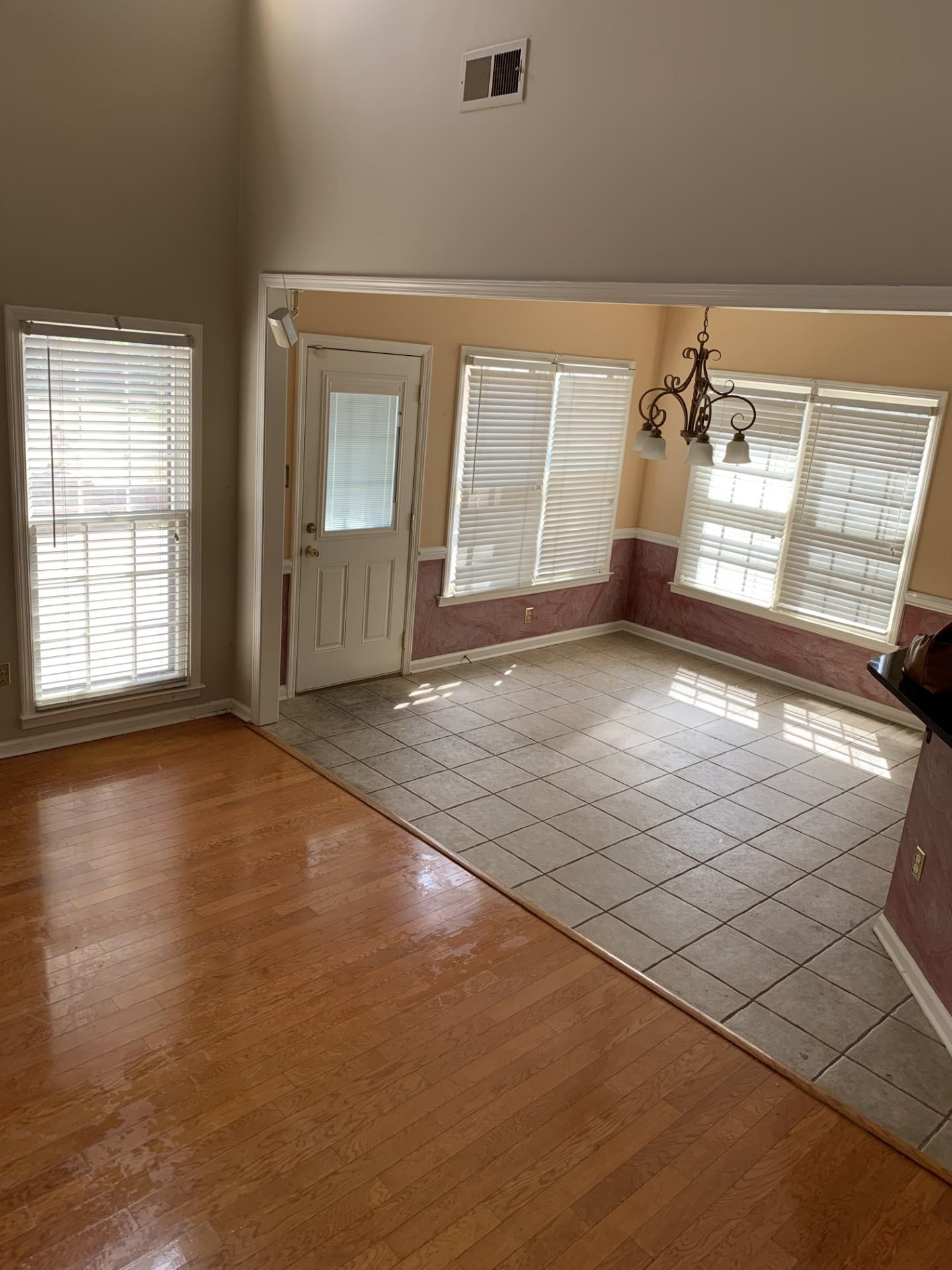 8717 Dexter Road Memphis, TN 38016 - Photo 6 of 12 Open concept Great room with large eating area, bar and access to patio.