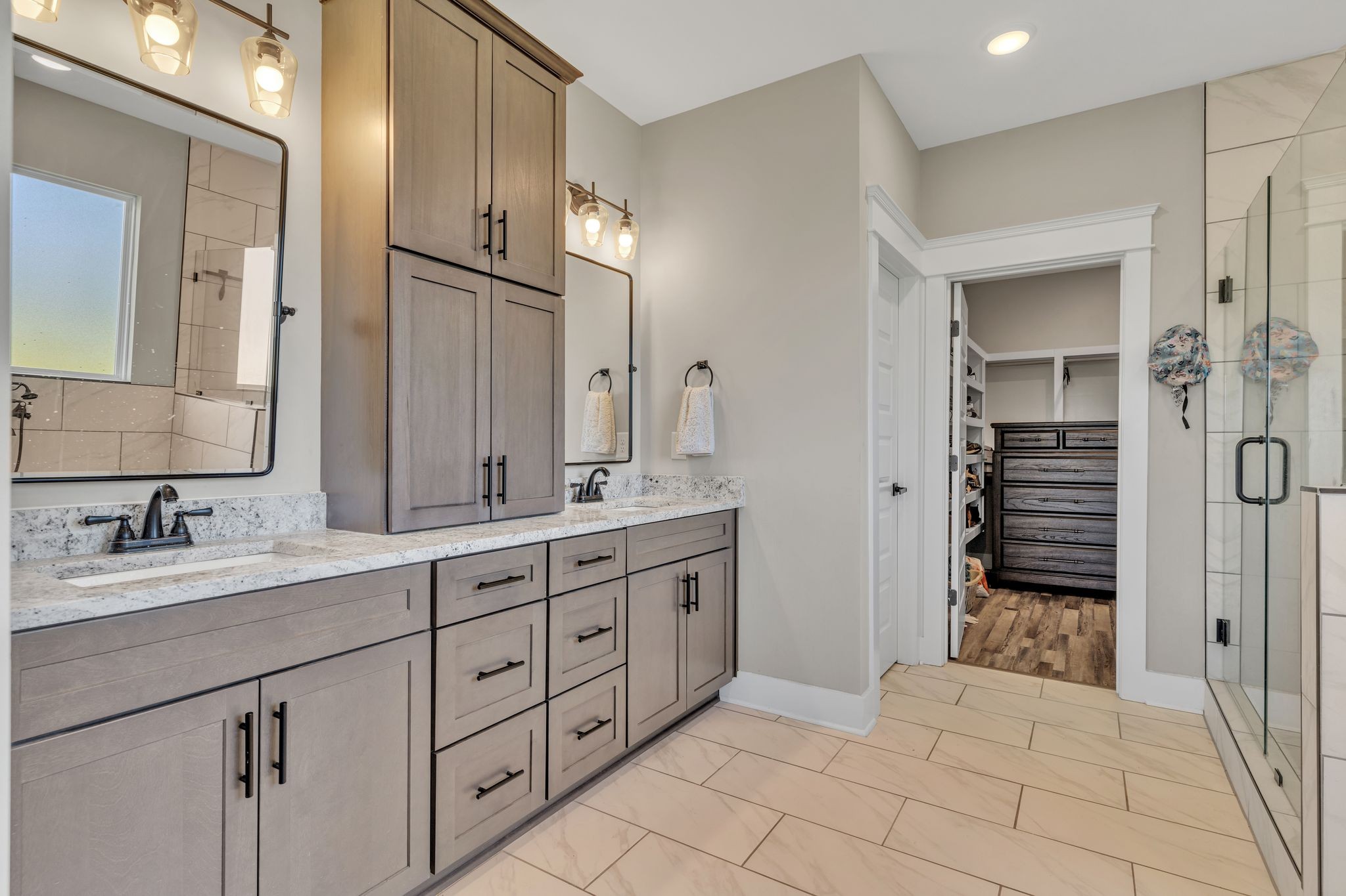 2487 Cave Springs Road Greenbrier, TN 37073 - Photo 17 of 41 a spacious bathroom with a granite countertop sink and a mirror