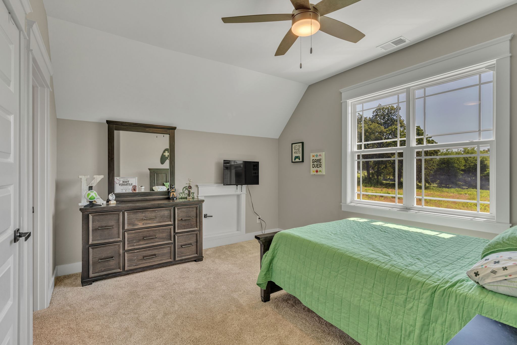 2487 Cave Springs Road Greenbrier, TN 37073 - Photo 27 of 41 a bedroom with a bed and a large window