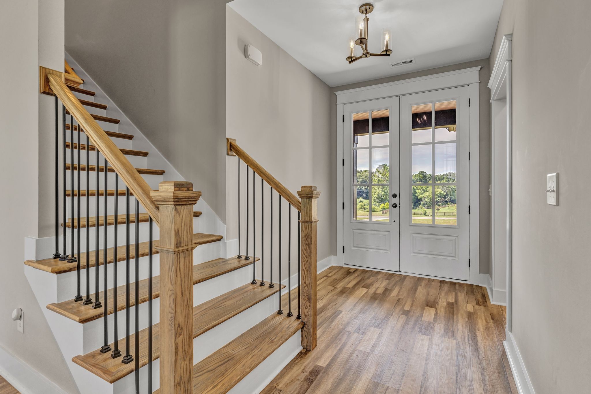 2487 Cave Springs Road Greenbrier, TN 37073 - Photo 5 of 41 a view of an entryway with wooden floor