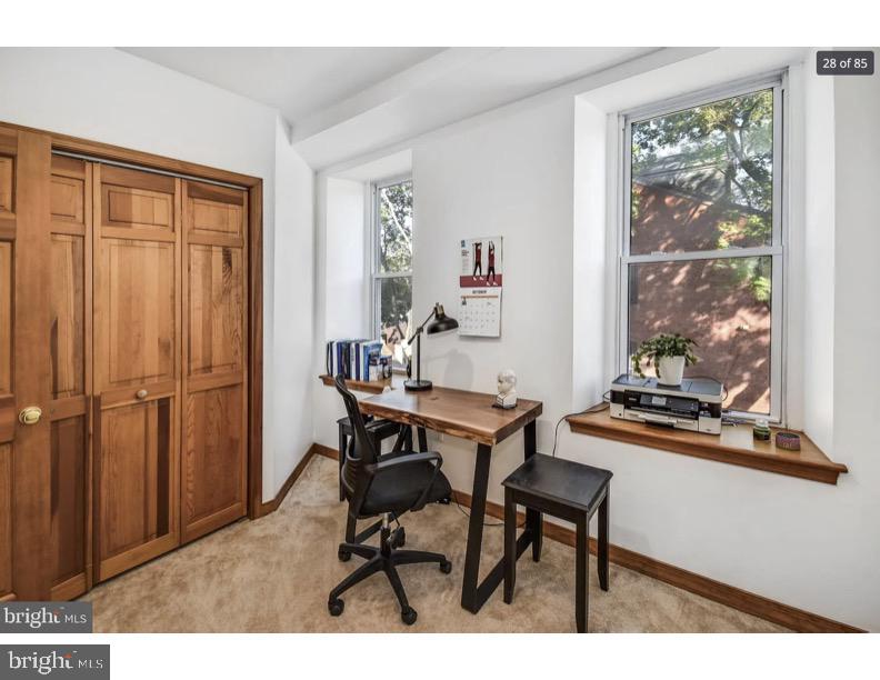 7928 Ridge Avenue Philadelphia, PA 19128 - Photo 14 of 38 a view of a workspace with furniture and window