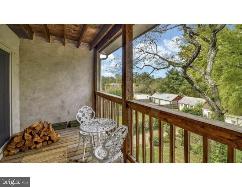 7928 Ridge Avenue Philadelphia, PA 19128 - Photo 28 of 38 a black and white photo of a living room