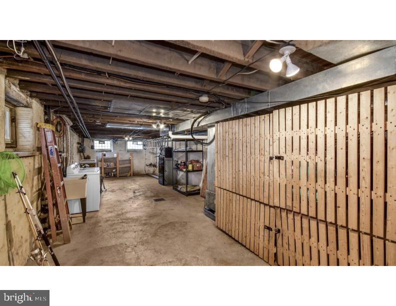 7928 Ridge Avenue Philadelphia, PA 19128 - Photo 29 of 38 a black and white photo of a room