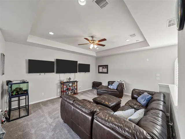 a living room with furniture and a couch