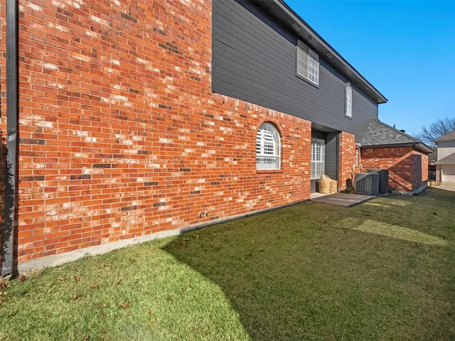 a view of a couches and a flat screen tv