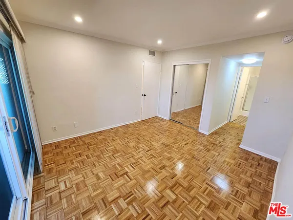 an empty room with a natural light