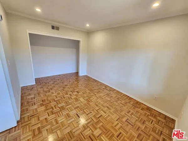a view of hallway with a large window