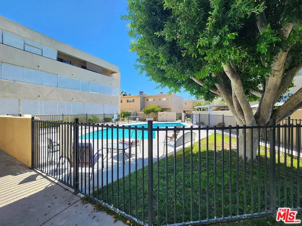 a view of a balcony with staircase