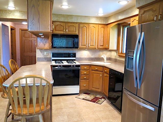 2453 Ridge Road McKeesport, PA 15135 - Photo 4 of 19 Another view of the kitchen. Home warranty is available with this home too.