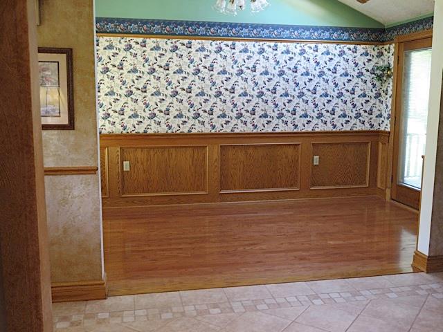2453 Ridge Road McKeesport, PA 15135 - Photo 6 of 19 Across from the kitchen is the dining room with plenty of gleaming hardwood floors. The door on the right goes out to a deck with a gazebo and Trex decking.