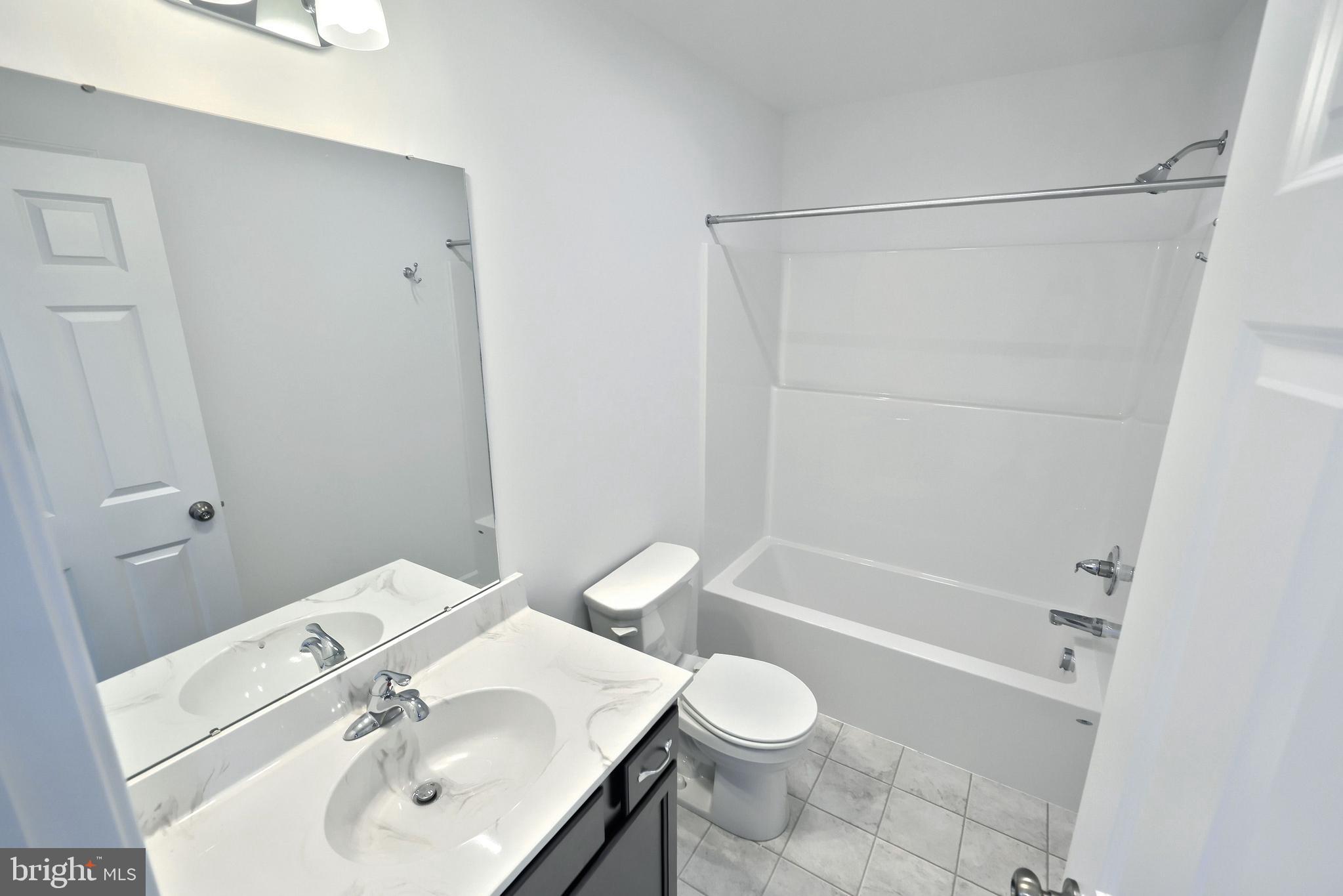 63 Glenn View Carlisle, PA 17013 - Photo 18 of 20 a bathroom with a sink toilet and shower