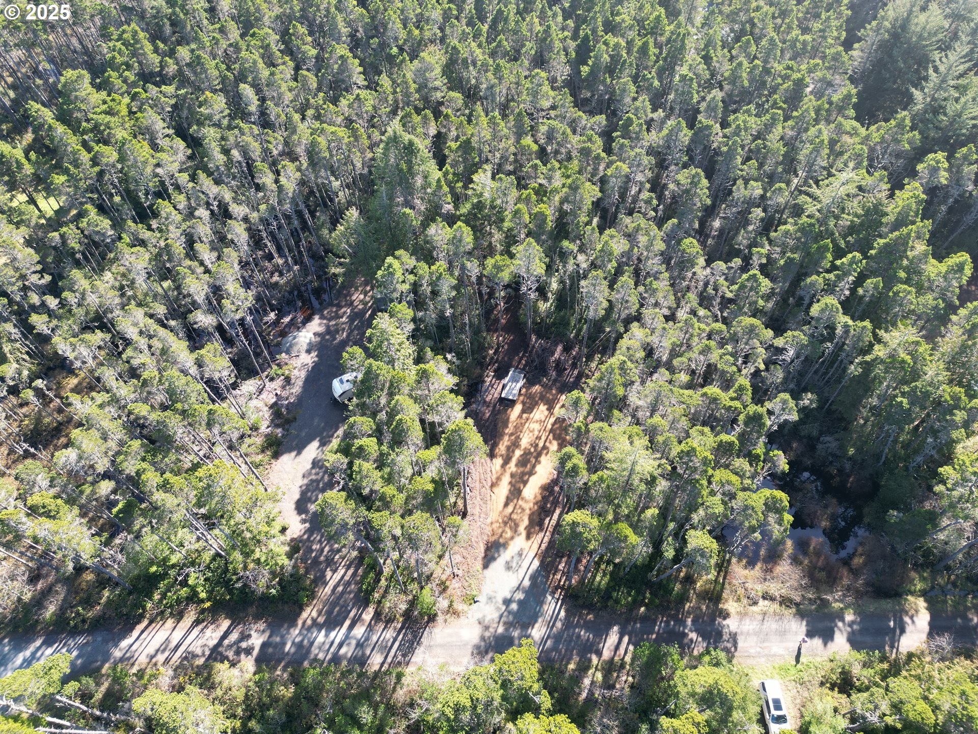 East Jupiter Lane, Unit 1202 Bandon, OR 97411 - Photo 6 of 9 a backyard of a house
