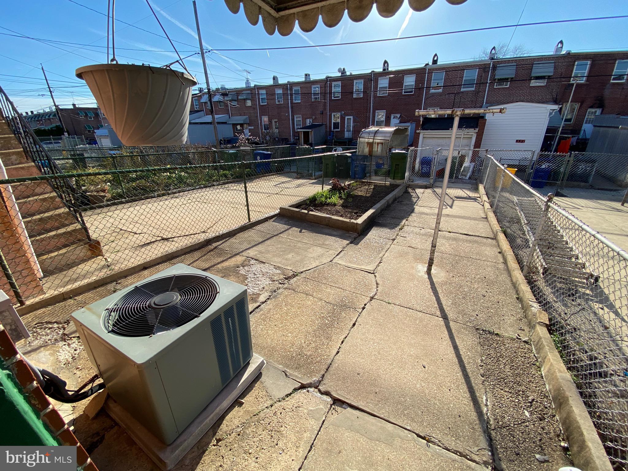 338 Gusryan Street Baltimore, MD 21224 - Photo 20 of 20 a view of a terrace with seating space