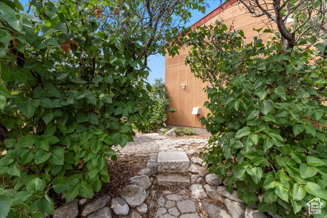 11450 Pigeon Hollow Road Spring City, UT 84662 - Photo 28 of 47 View of yard with a patio area and a storage unit