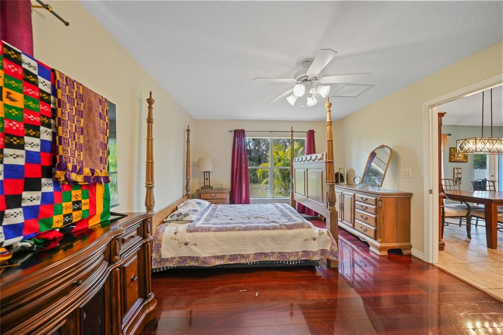 1291 Impala Street North Port, FL 34288 - Photo 19 of 44 a bedroom with bed and a baby crib