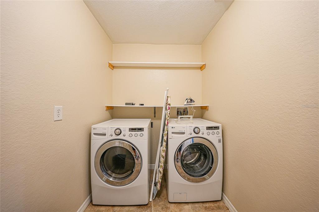 1291 Impala Street North Port, FL 34288 - Photo 30 of 44 a utility room with dryer and washer