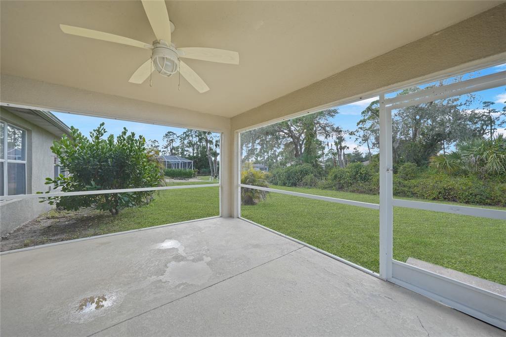 1291 Impala Street North Port, FL 34288 - Photo 32 of 44 a view of a porch and garden