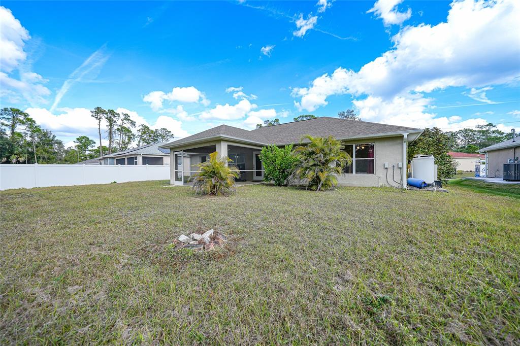 1291 Impala Street North Port, FL 34288 - Photo 35 of 44 a house view with a garden space