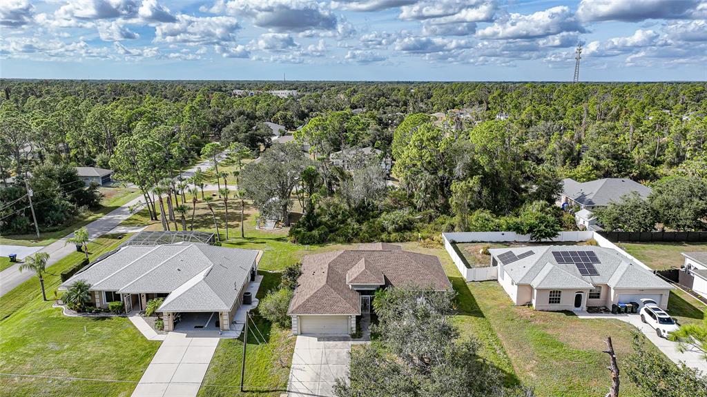 1291 Impala Street North Port, FL 34288 - Photo 43 of 44 an aerial view of a house with a garden