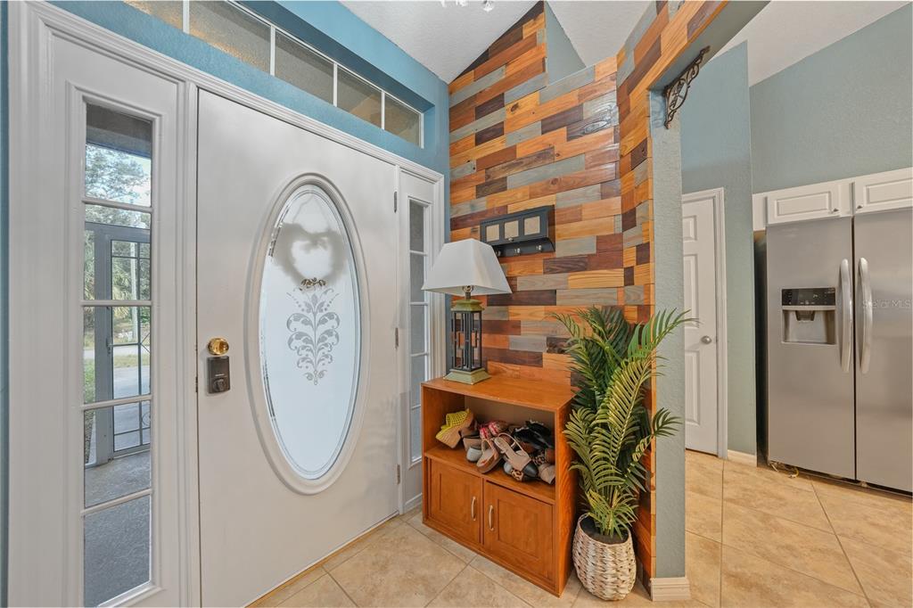 1291 Impala Street North Port, FL 34288 - Photo 5 of 44 a front view of a house with garden