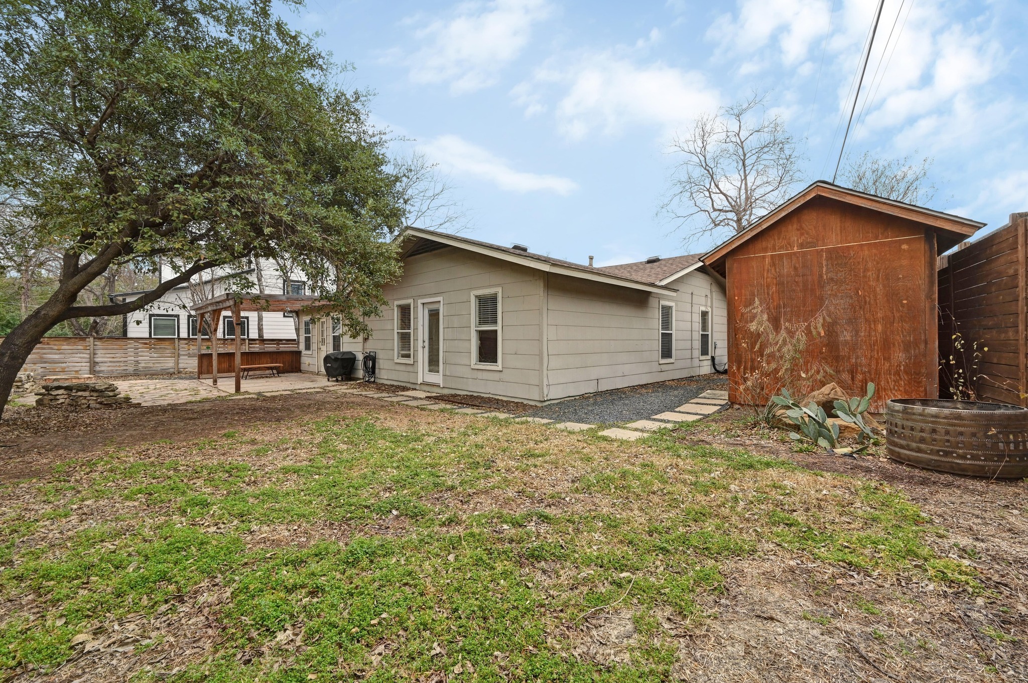 1005 Daphne Court Austin, TX 78704 - Photo 17 of 19 a front view of a house with garden