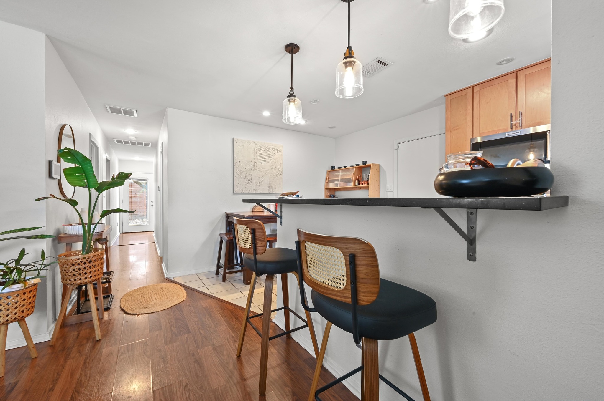 1005 Daphne Court Austin, TX 78704 - Photo 5 of 19 a view of a dining room with furniture and wooden floor