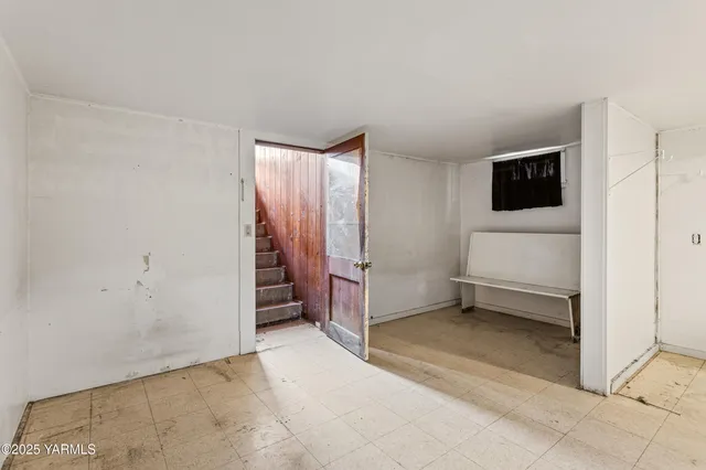 a view of a room with a flat screen tv