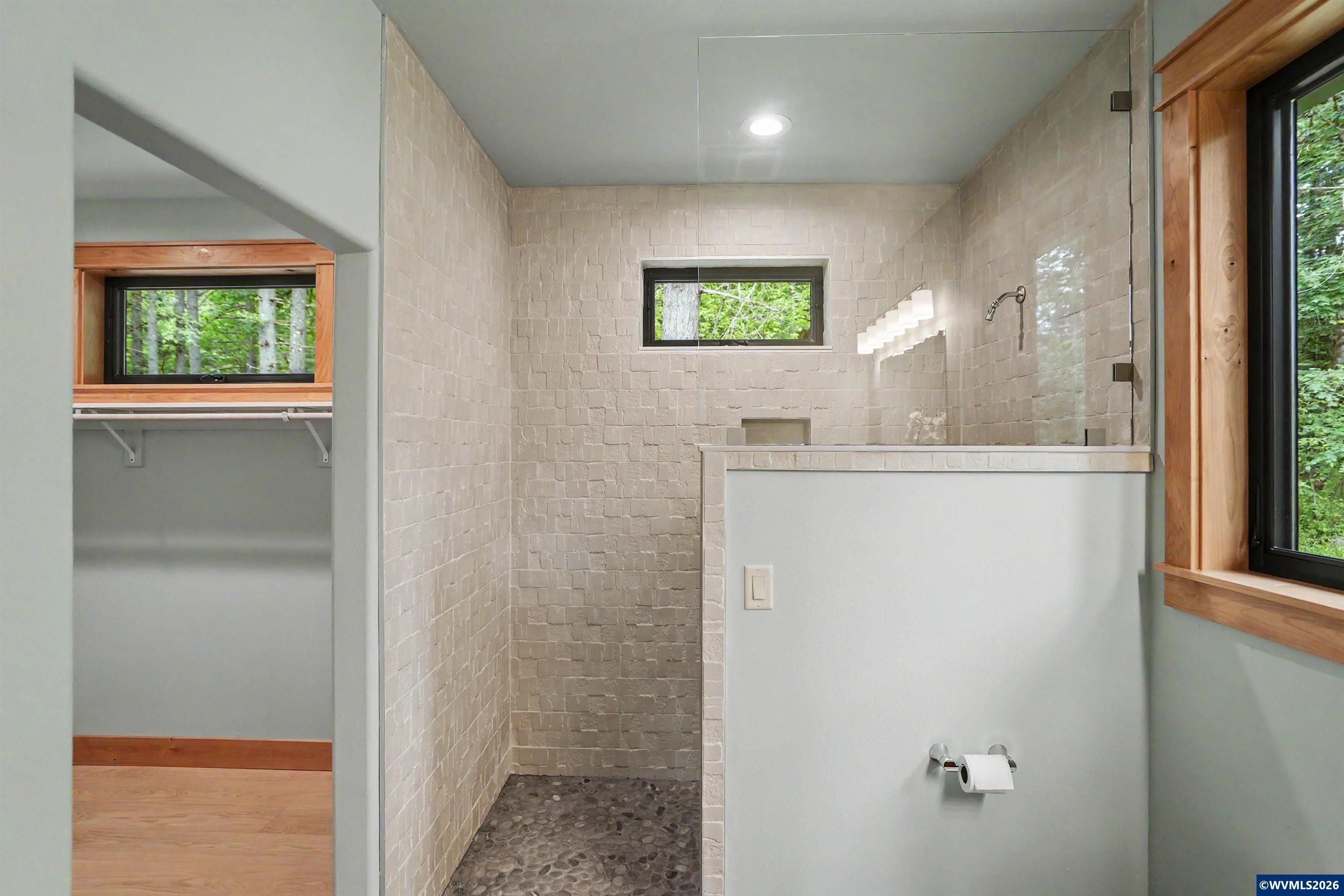 1155 Northwest Country Hills Road Corvallis, OR 97330 - Photo 45 of 48 a bathroom with a sink a mirror and a window