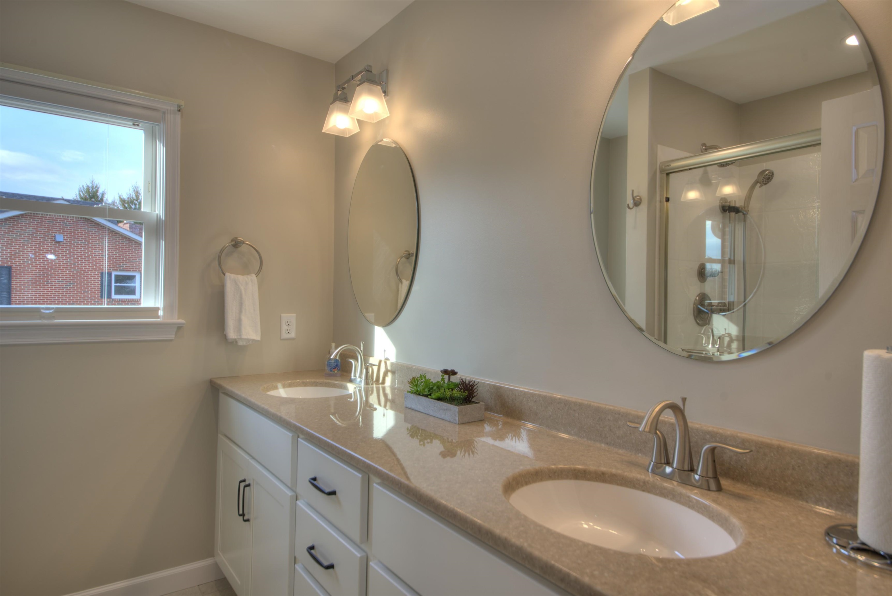 152 Huntington Place Waynesboro, VA 22980 - Photo 11 of 73 a bathroom with double vanity sinks and a mirror