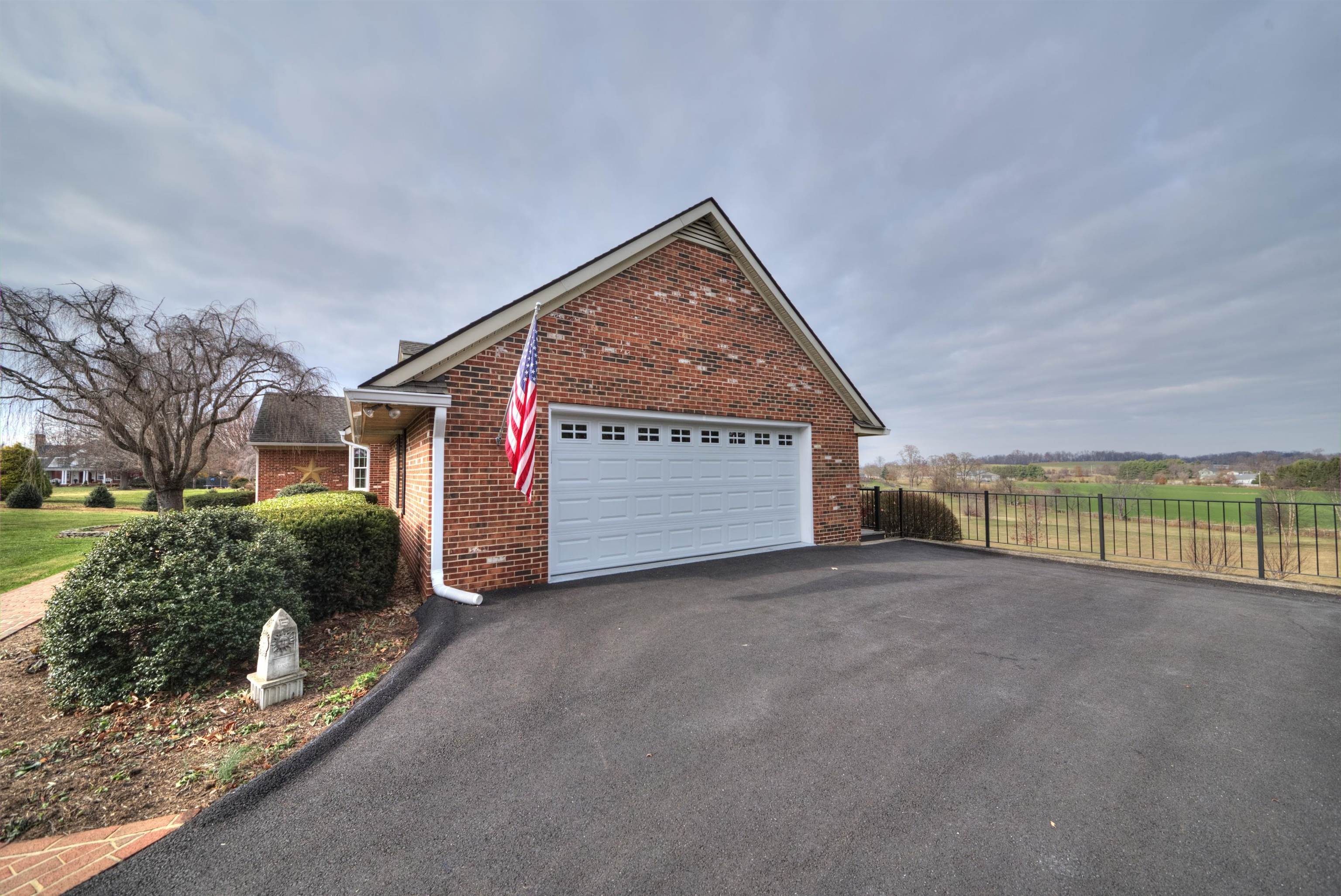 152 Huntington Place Waynesboro, VA 22980 - Photo 24 of 73 a view of a house with a yard and garage