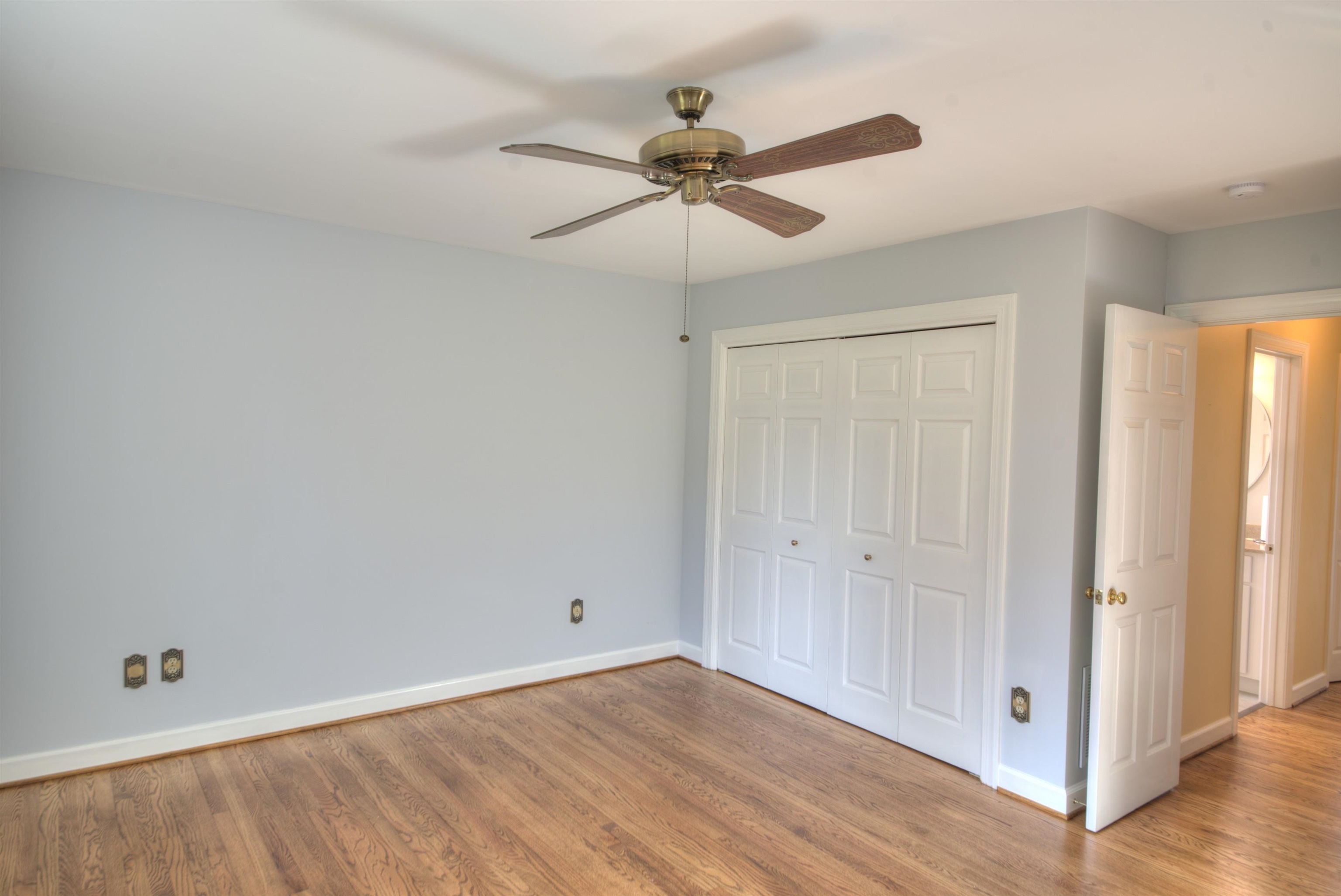 152 Huntington Place Waynesboro, VA 22980 - Photo 46 of 73 a view of an empty room with wooden floor