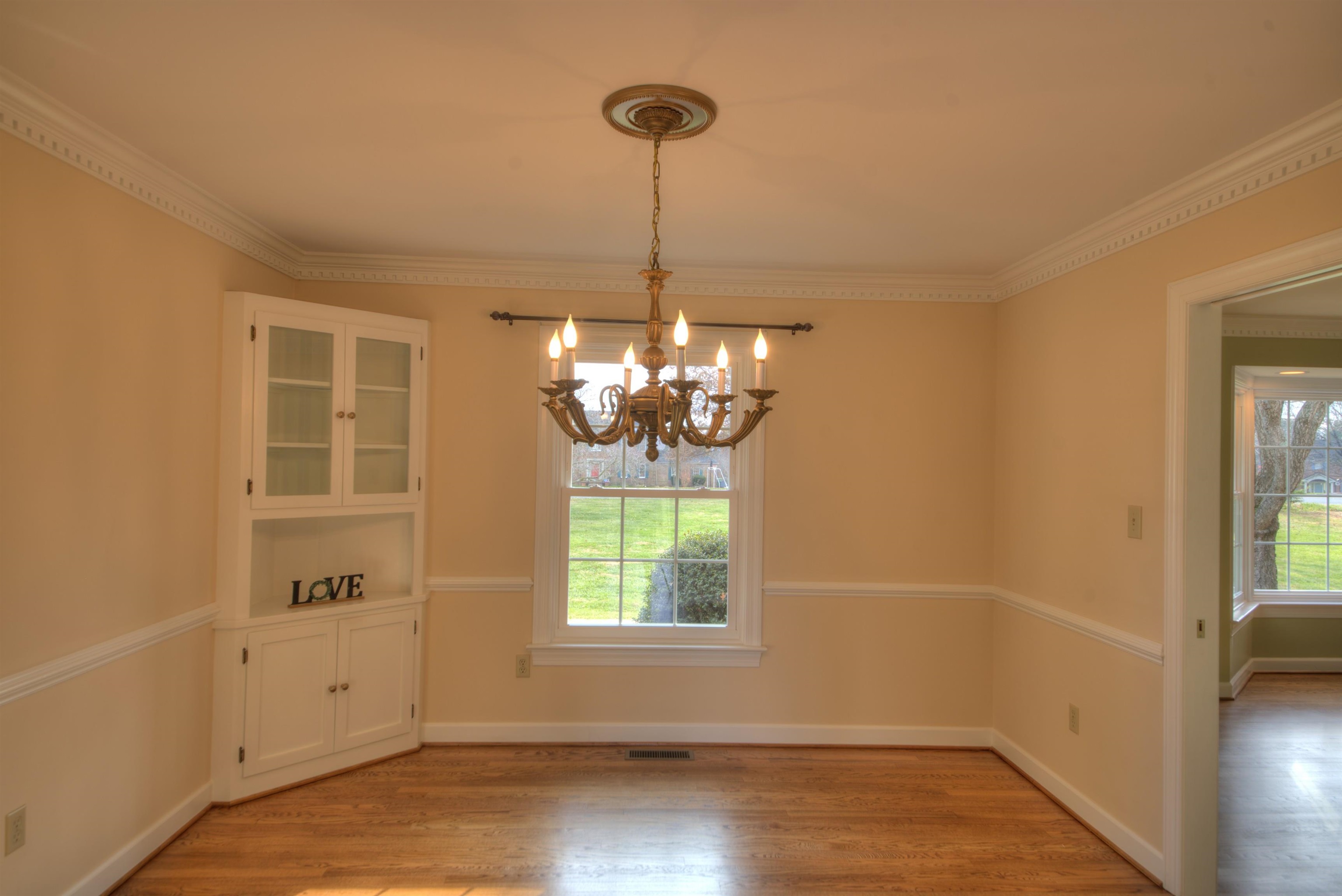 152 Huntington Place Waynesboro, VA 22980 - Photo 5 of 73 a bathroom with a window and a chandelier